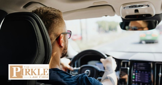 man driving during summer